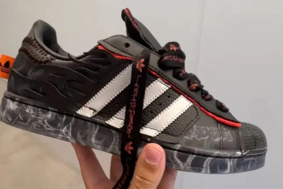 hellstar adidas superstar in hand