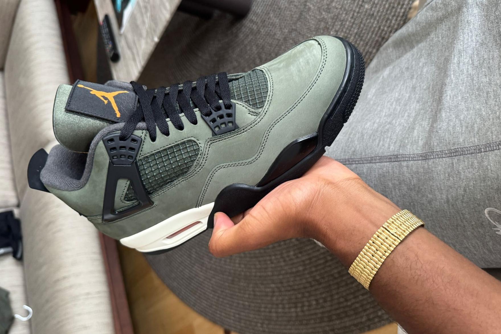 Hinh anh 2: Undefeated x Air Jordan 4 voi thiet ke da lon olive va luoi cam