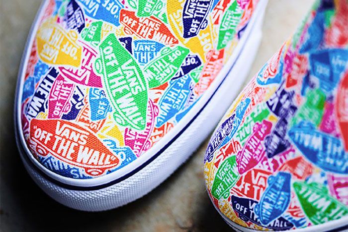 Vans multicolor best sale slip ons