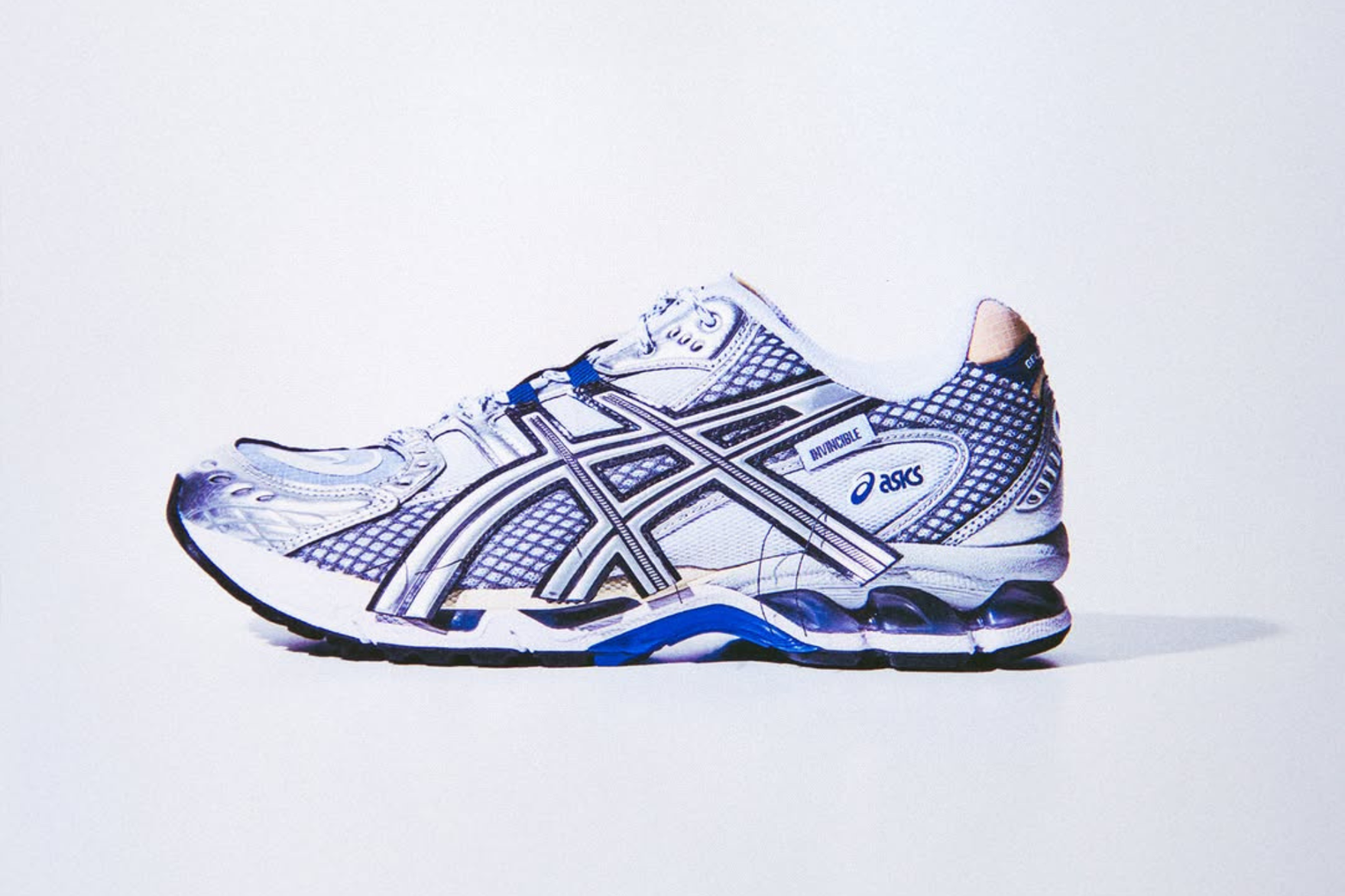 (side profile) asics sneaker with blue detailing