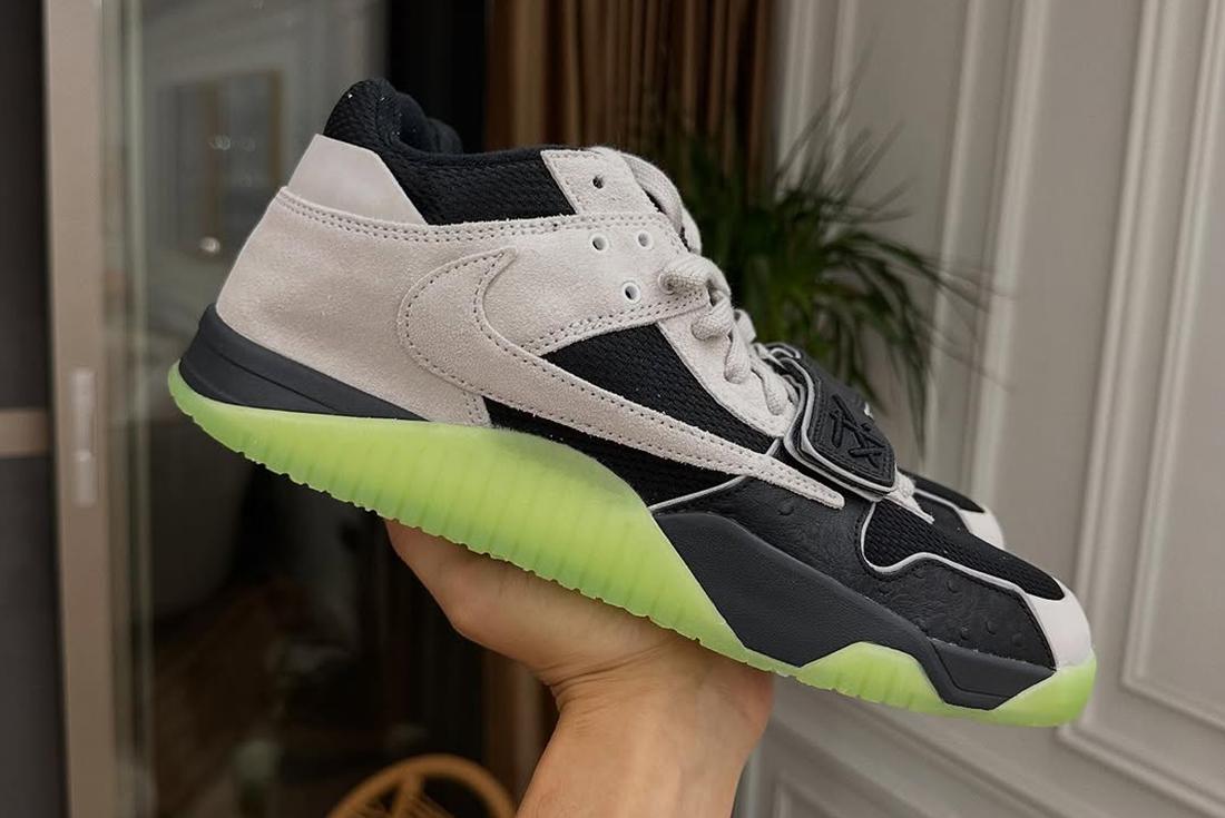 Chase B Jumpman Jack sneaker held in a man's hand