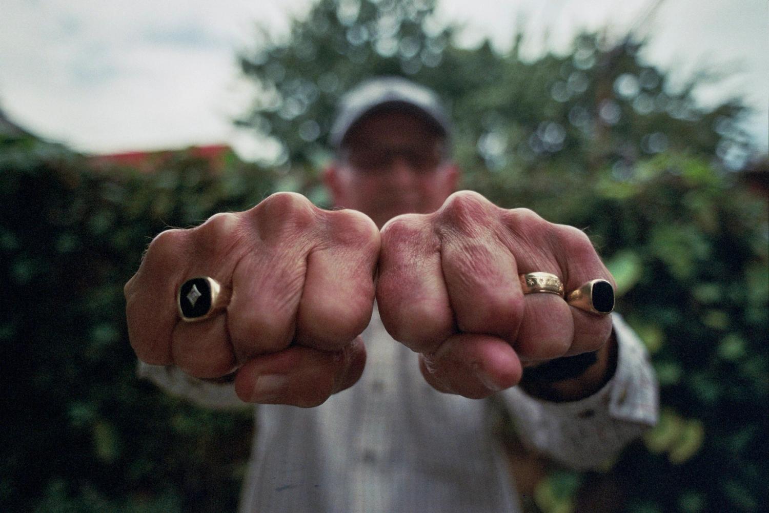 Close up of rings on hands, blurred background