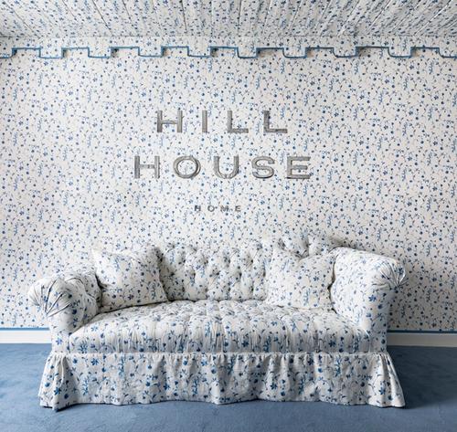 Patterned floral Hill House sofa and wallpaper