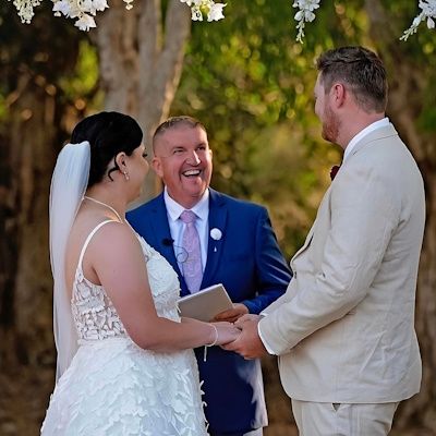 Mark conducting a ceremony with a couple