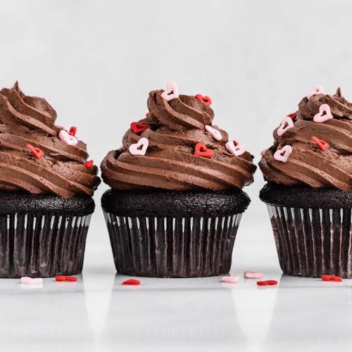 Delicious vegan and gluten-free dark chocolate cupcakes created with Almond Cow milk machine