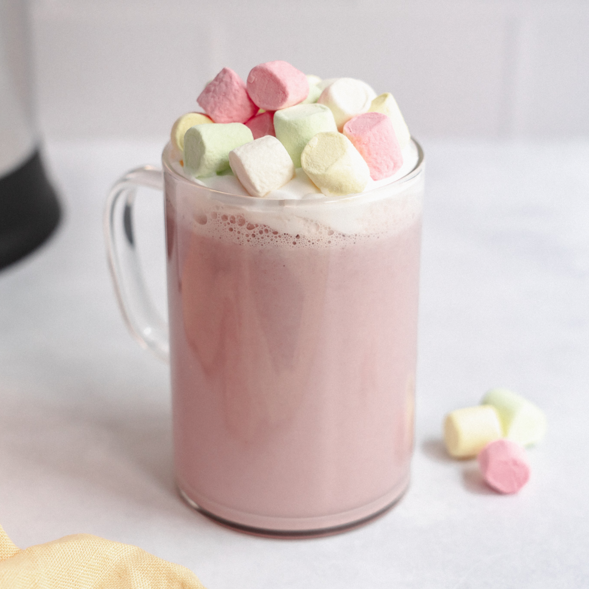 Pink Unicorn Hot Chocolate prepared with berries, cashews, and white chocolate