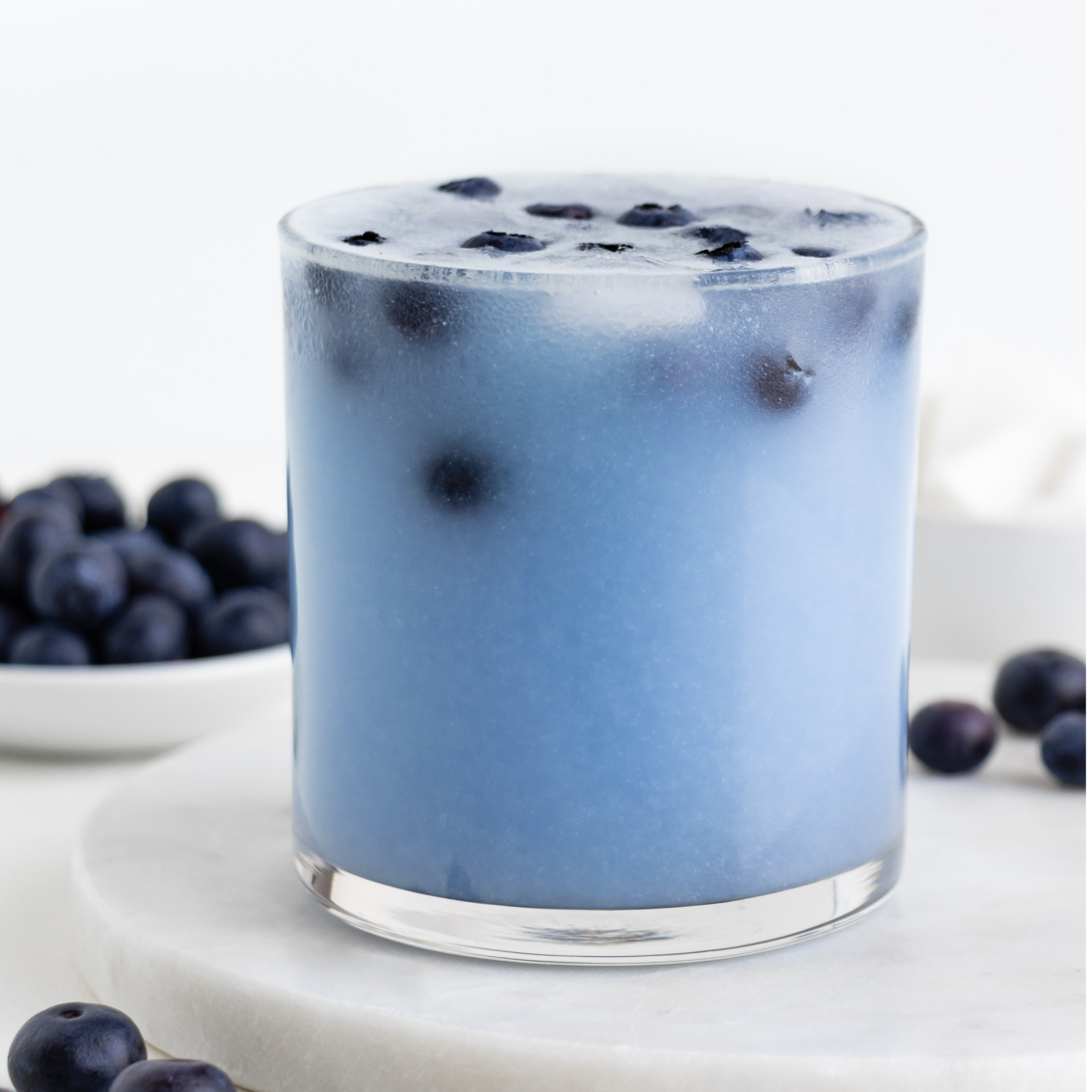 Family enjoying vibrant Blue July recipes from Almond Cow