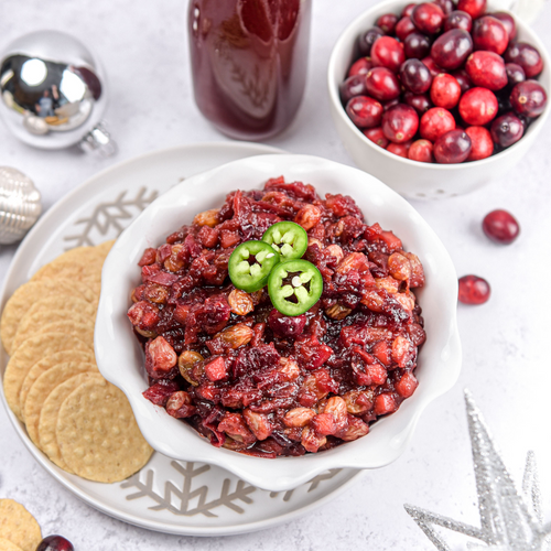 Vibrant cranberry jalapeno chutney spread on toast, a flavorsome accompaniment to your holiday meals