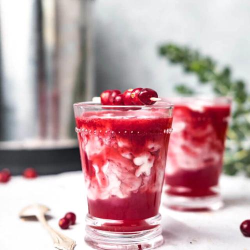 A festive, dairy-free Cranberry Latte made with Almond Cow milk