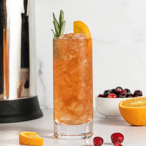 Refreshing Cranberry Sherry Cobbler cocktail garnished with rosemary
