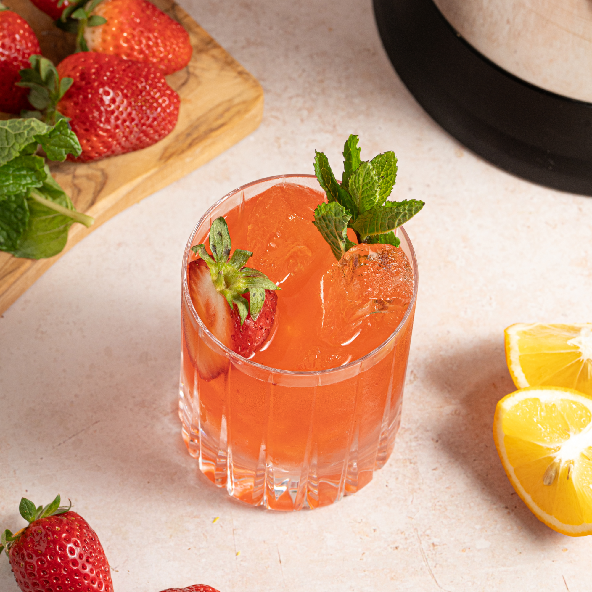 Strawberry Bourbon Smash cocktail prepared using an Almond Cow machine