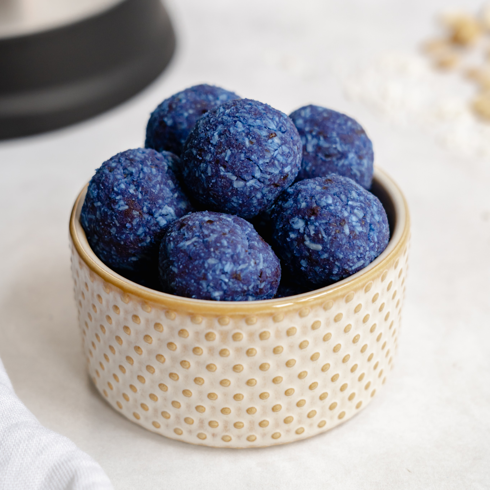 Blue Coconut Bliss Balls - A simple and quick snack made with Almond Cow milk machine