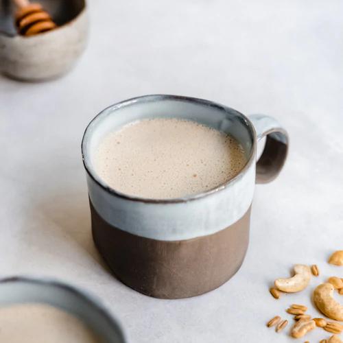 Creamy, Frothy, and Slightly Sweetened Oat Cashew Honey Latte via Almond Cow