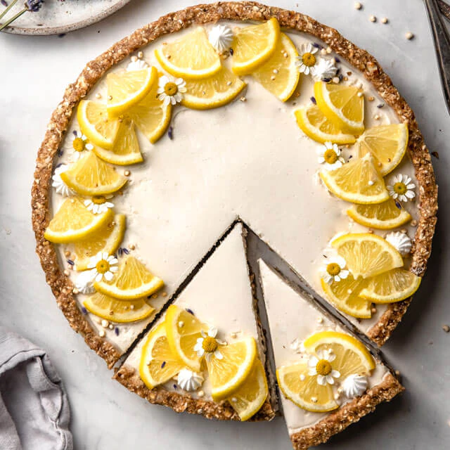 A refreshing gluten and dairy-free Lemon Lavender Tart made with creamy cashew and almond pulp crust