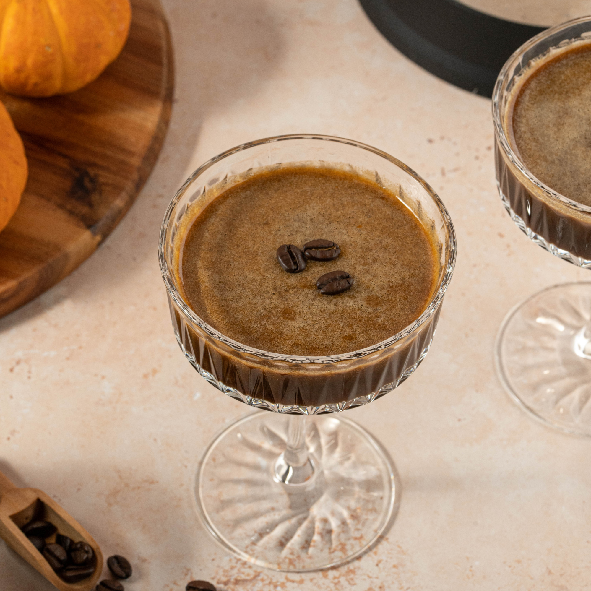 Pumpkin Spiced Espresso Martini in a glass, crafted with the Almond Cow machine