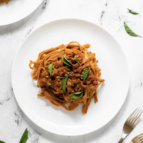 Hearty Mushroom Walnut Bolognese served with noodles