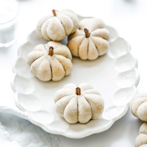 This image features scrumptious Spiced Pumpkin Dinner Rolls prepared using the Almond Cow