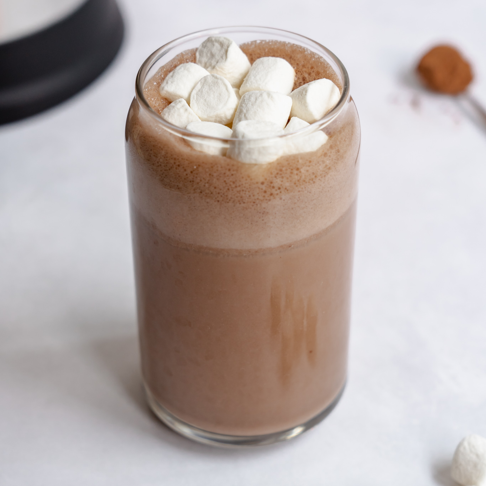 Rocky Road Milk prepared with Almond Cow machine, combining almonds, chocolate, and marshmallows