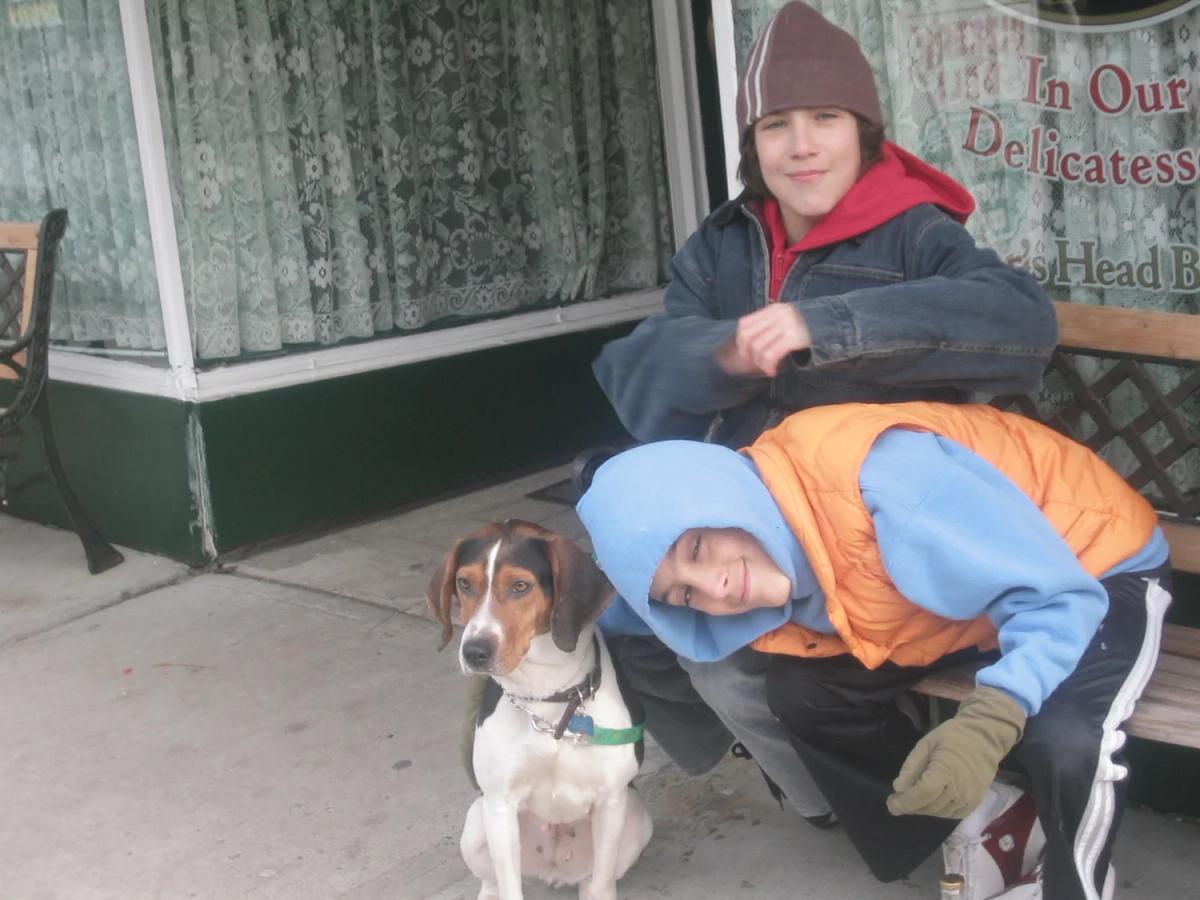 Two boys with a dog