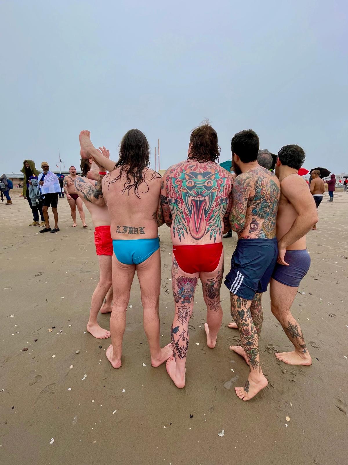 tattooed beach men
