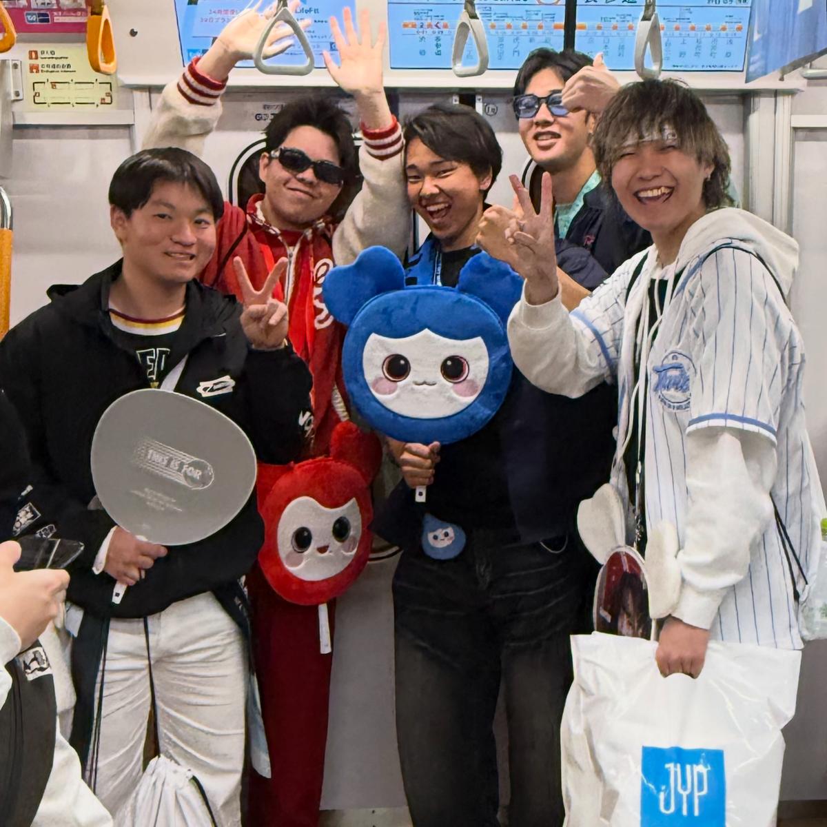 teen boys on a train in Tokyo