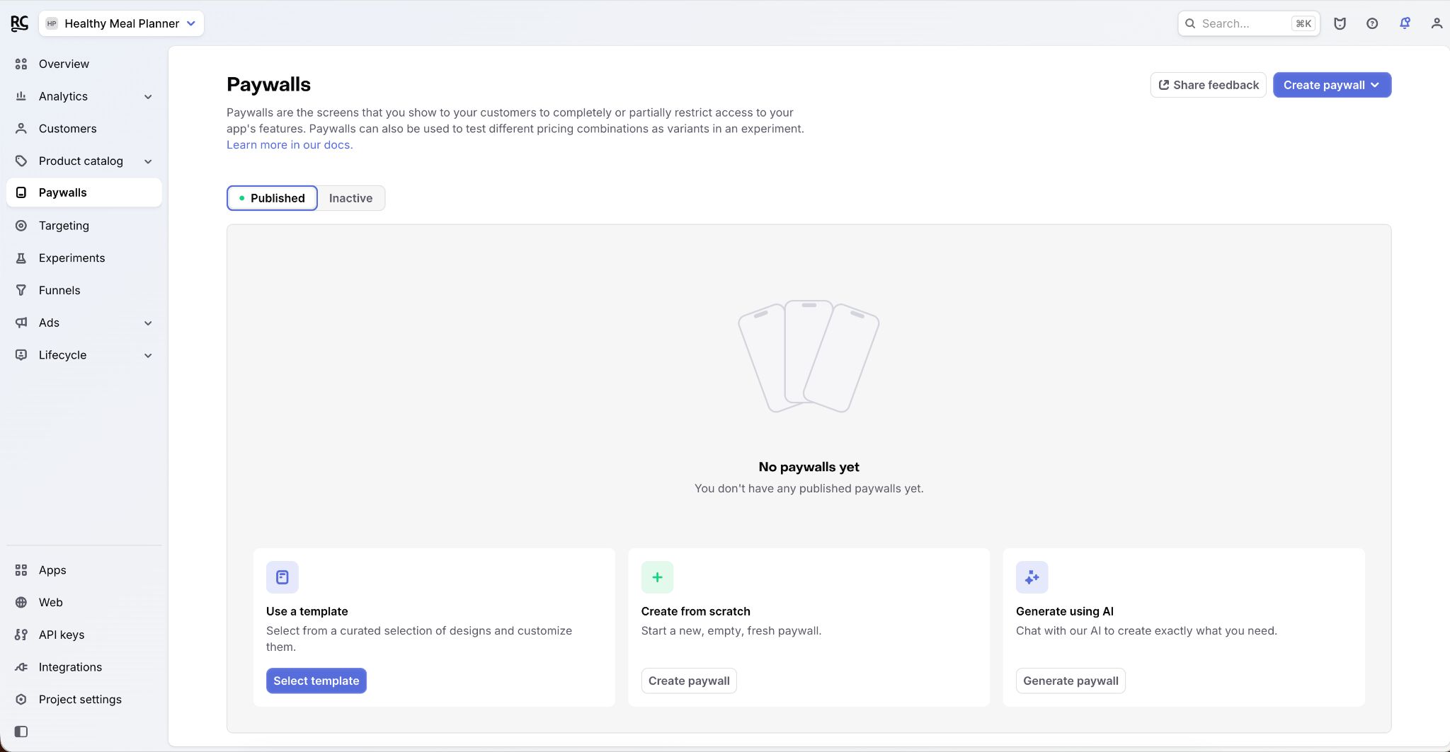 RevenueCat’s Paywalls page for the Healthy Meal Planner project, showing that no paywalls have been published and offering options to use a template, create one from scratch, or generate one with AI.