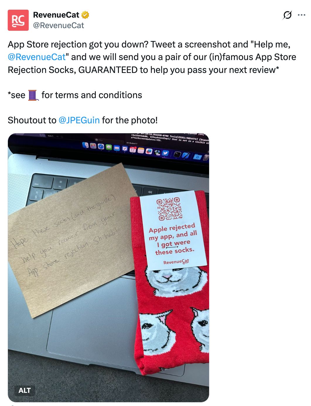 RevenueCat post offering “App Store Rejection Socks” to developers whose apps are rejected by Apple, alongside a photo of red cat-patterned socks and a handwritten thank-you note on a laptop.