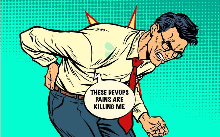 Comic panel: a man with glasses and a red tie grimacing in pain, clutching his hip, with a speech bubble reading "THESE DEVOPS PAINS ARE KILLING ME"