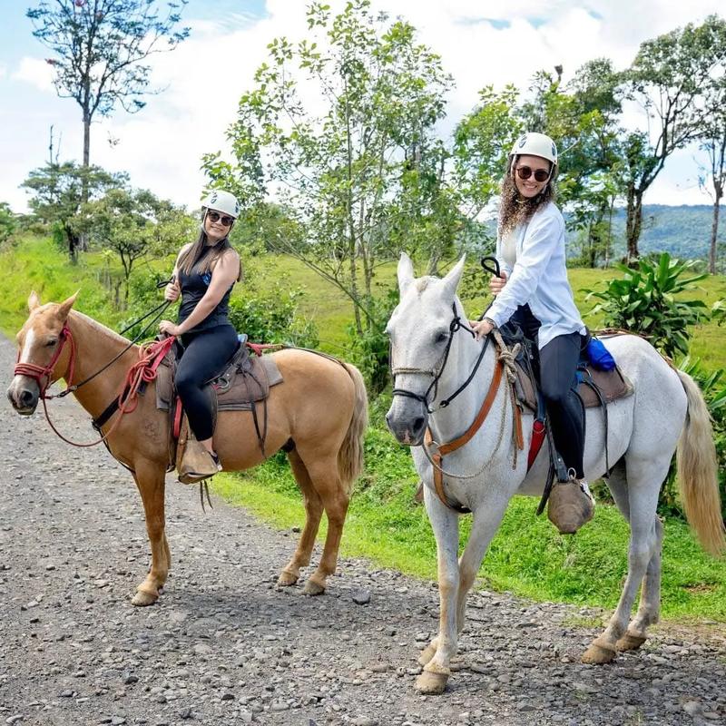 Guests on horseback riding tour on private trails in Bijagua, Costa Rica