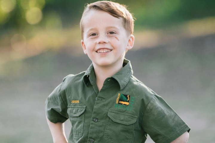 Child in croc kid ARP zookeeper uniform