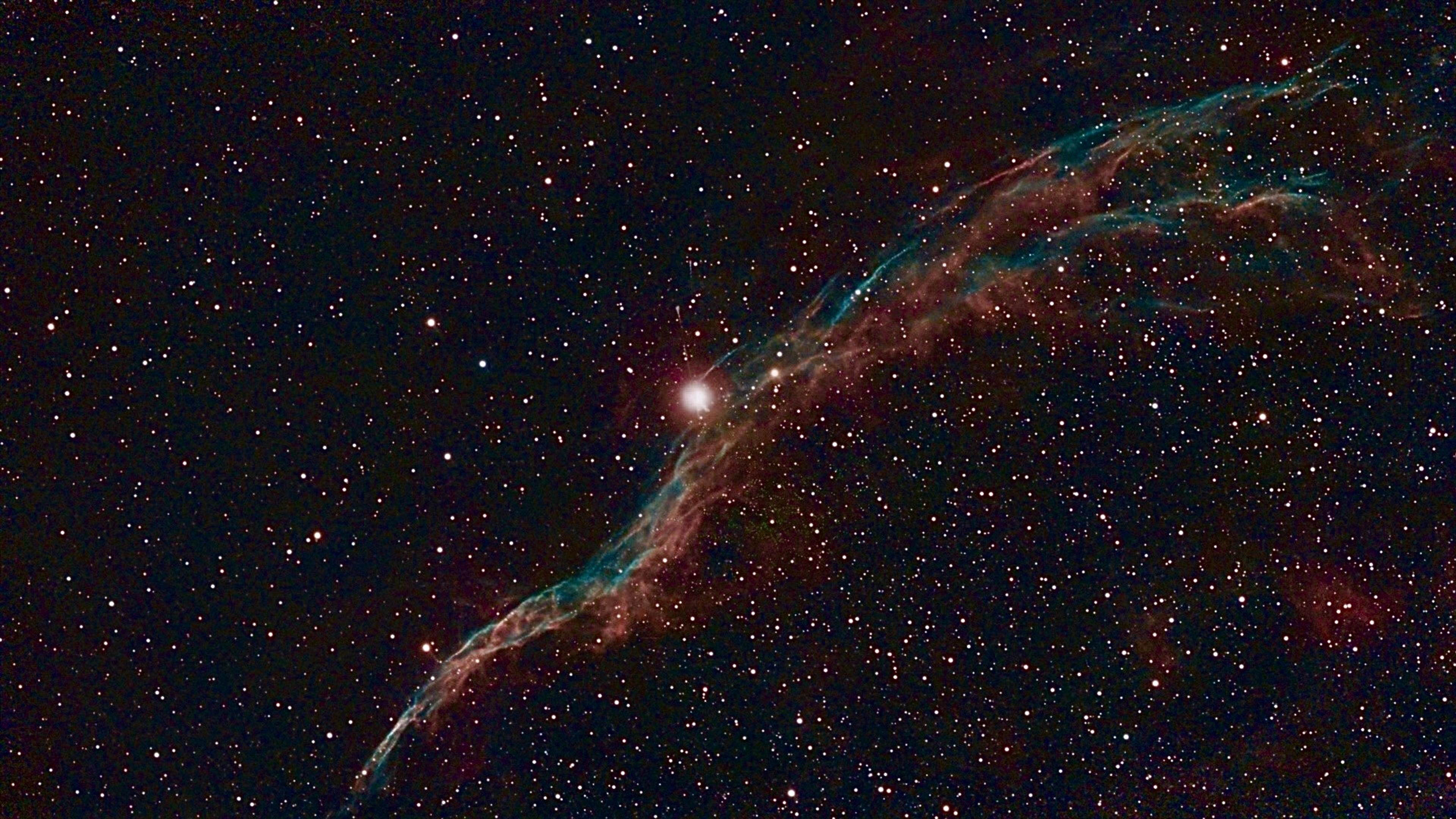 My first overnight shoot unattended. This is the Western Veil nebula, otherwise referred to as the Witch's Broom. The bright star in the centre of the shot, 52 Cygni, deceptively sits much closer to Earth than the nebula behind it.