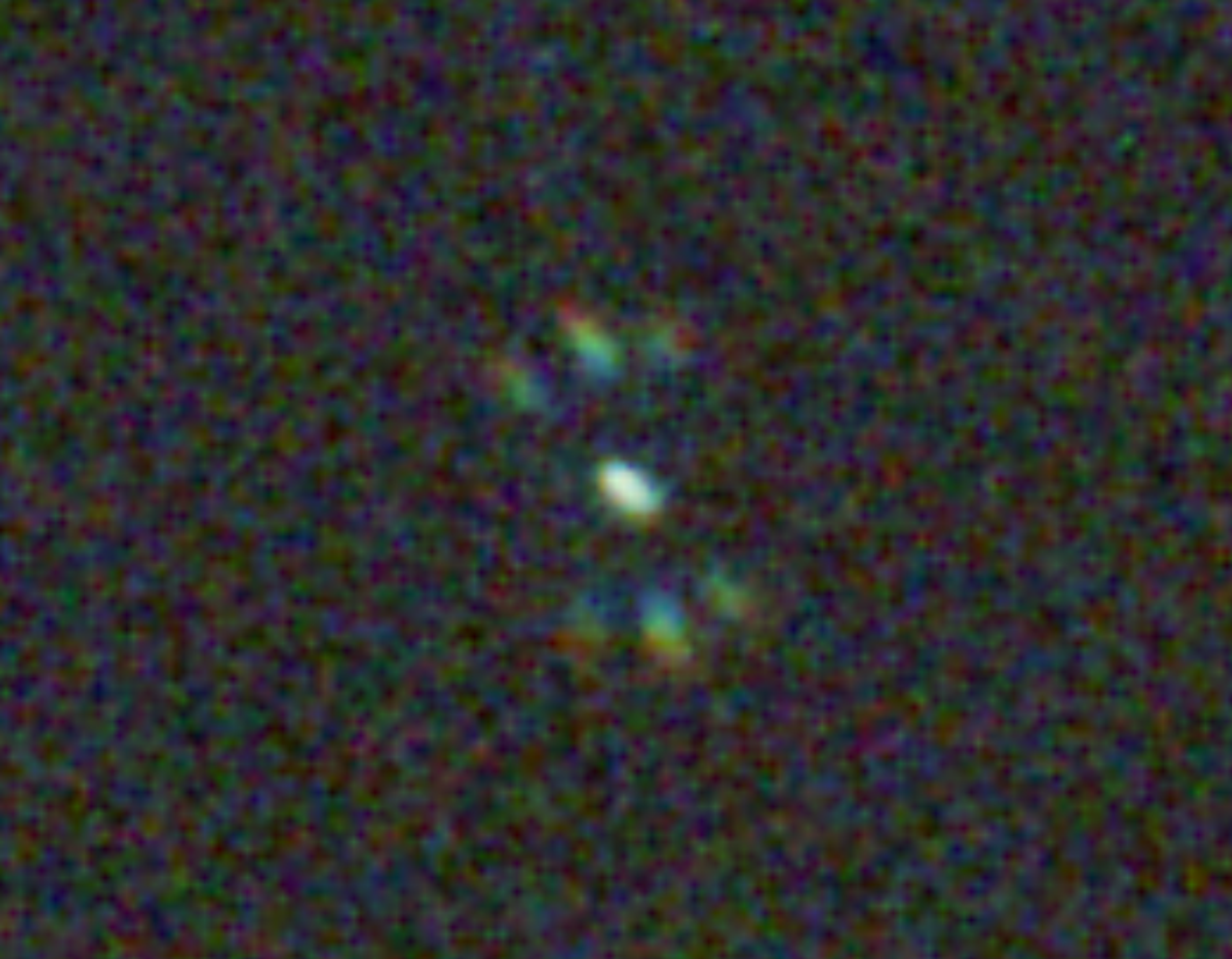 A star's Bahtinov diffraction spikes on a live-view screen, tightly converged — acceptably in focus