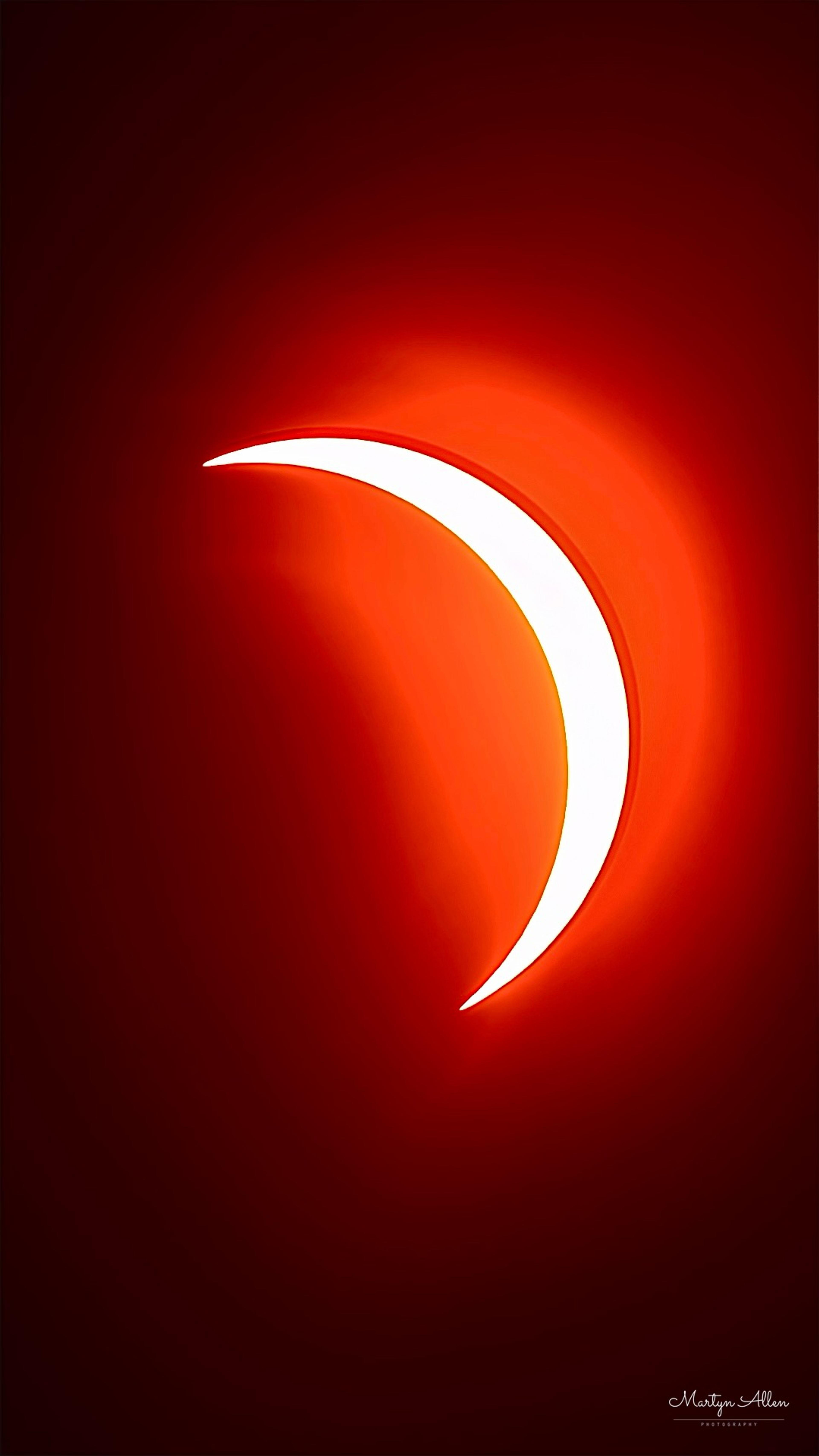 A 95.7% partial solar eclipse from East Hill, Sidmouth — one of the most dramatic seen from the UK in decades. Maximum eclipse fell with the Sun low near the western horizon, turning the crescent a deep sunset orange rather than the usual white-on-black.