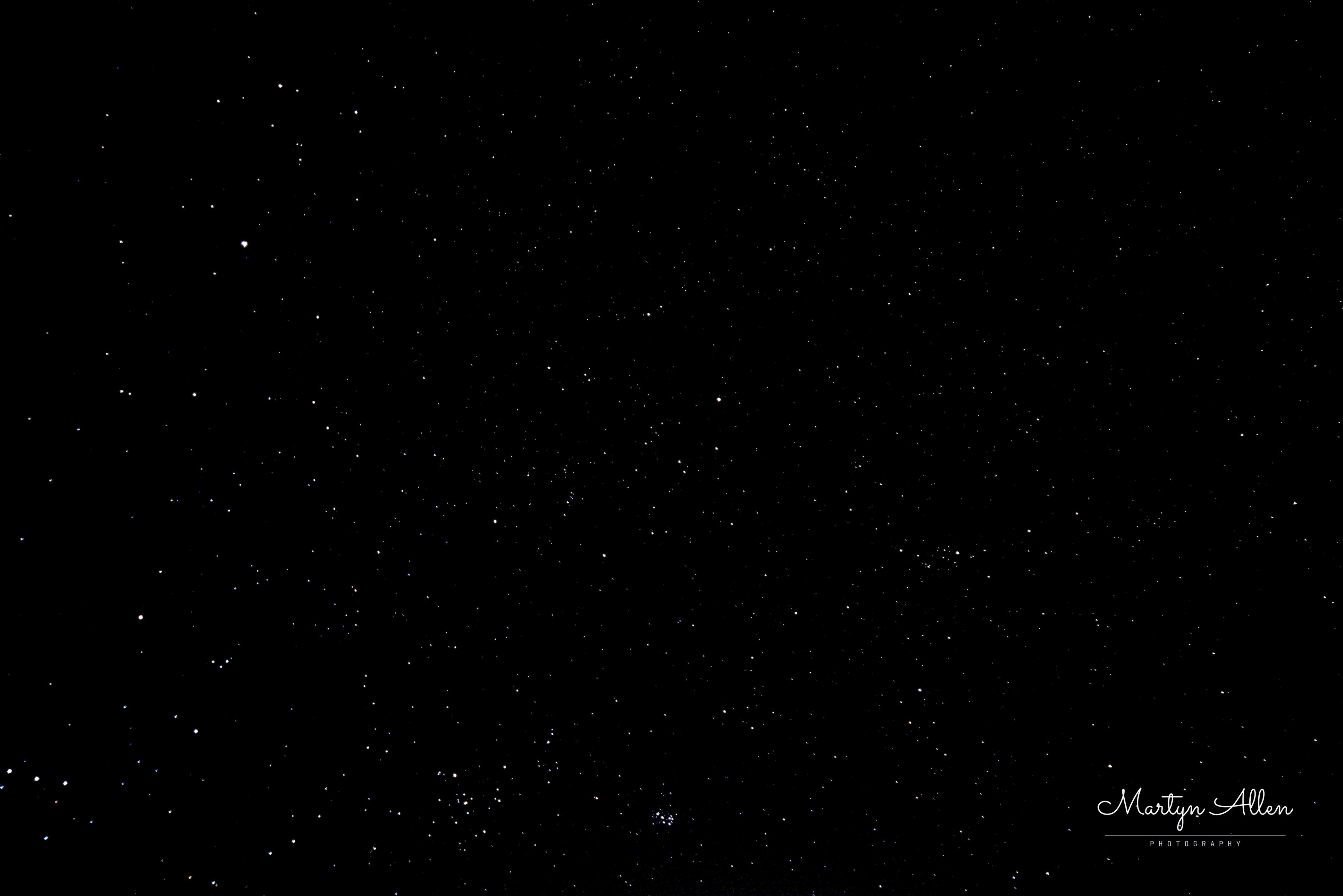 A wide-field star field with a couple of open clusters visible (can you spot Orion's Belt and the Pleiades - M45?) — a reminder of how much a 14mm lens can still pull out of a dark sky without a telescope.