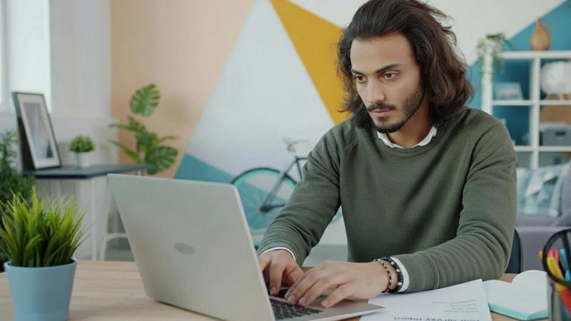 Man reading a surveyors report