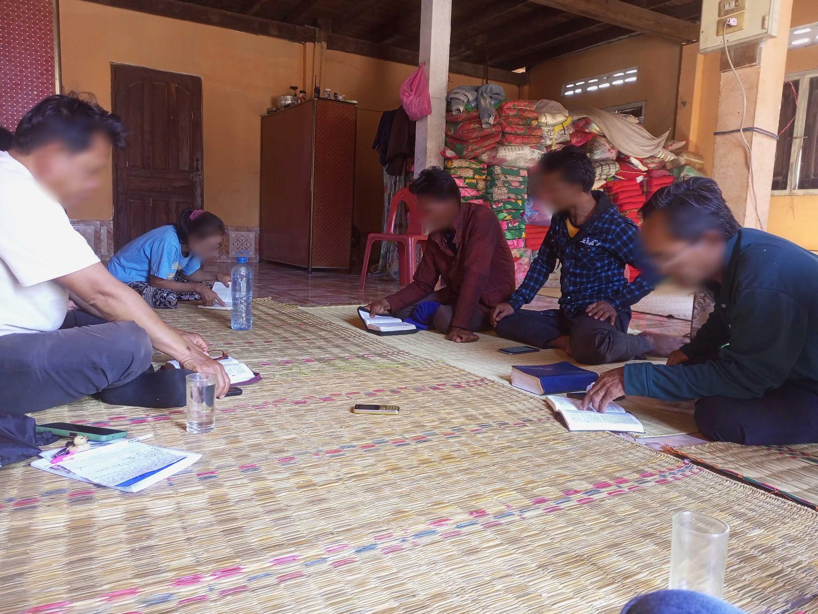 Laos, church worships as mob tears down their walls