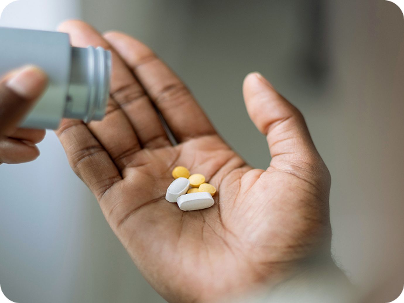Hand holding medication