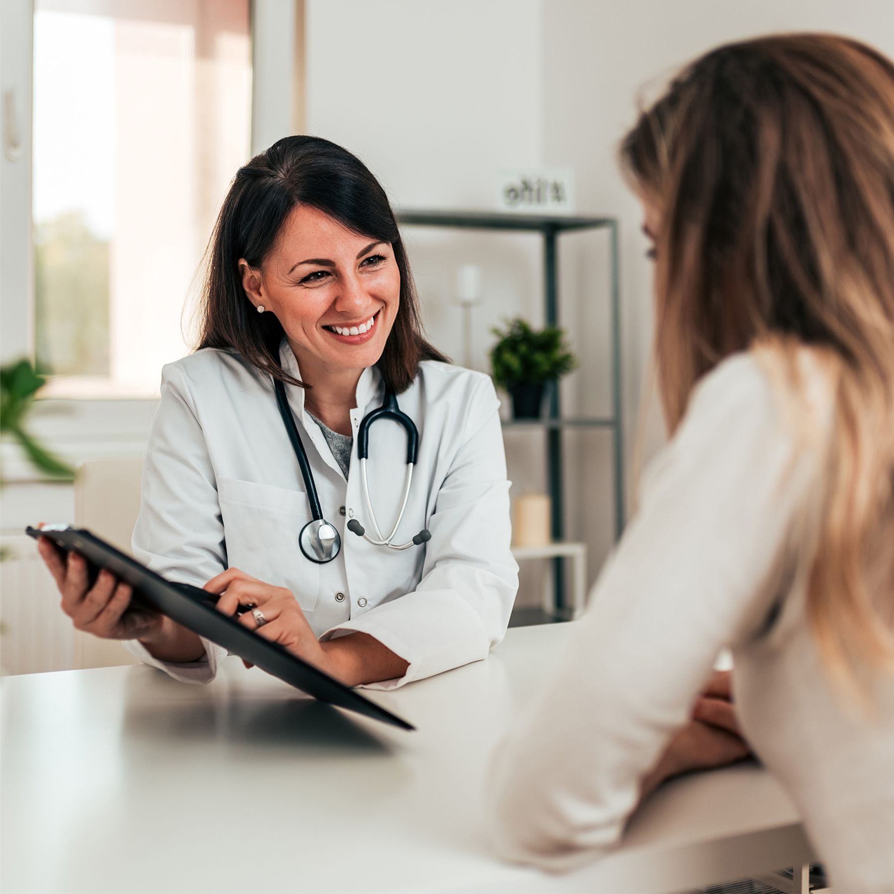 Rightway | Clinical Care Navigation | Effective Transparent PBM.. medical professional chatting with patient