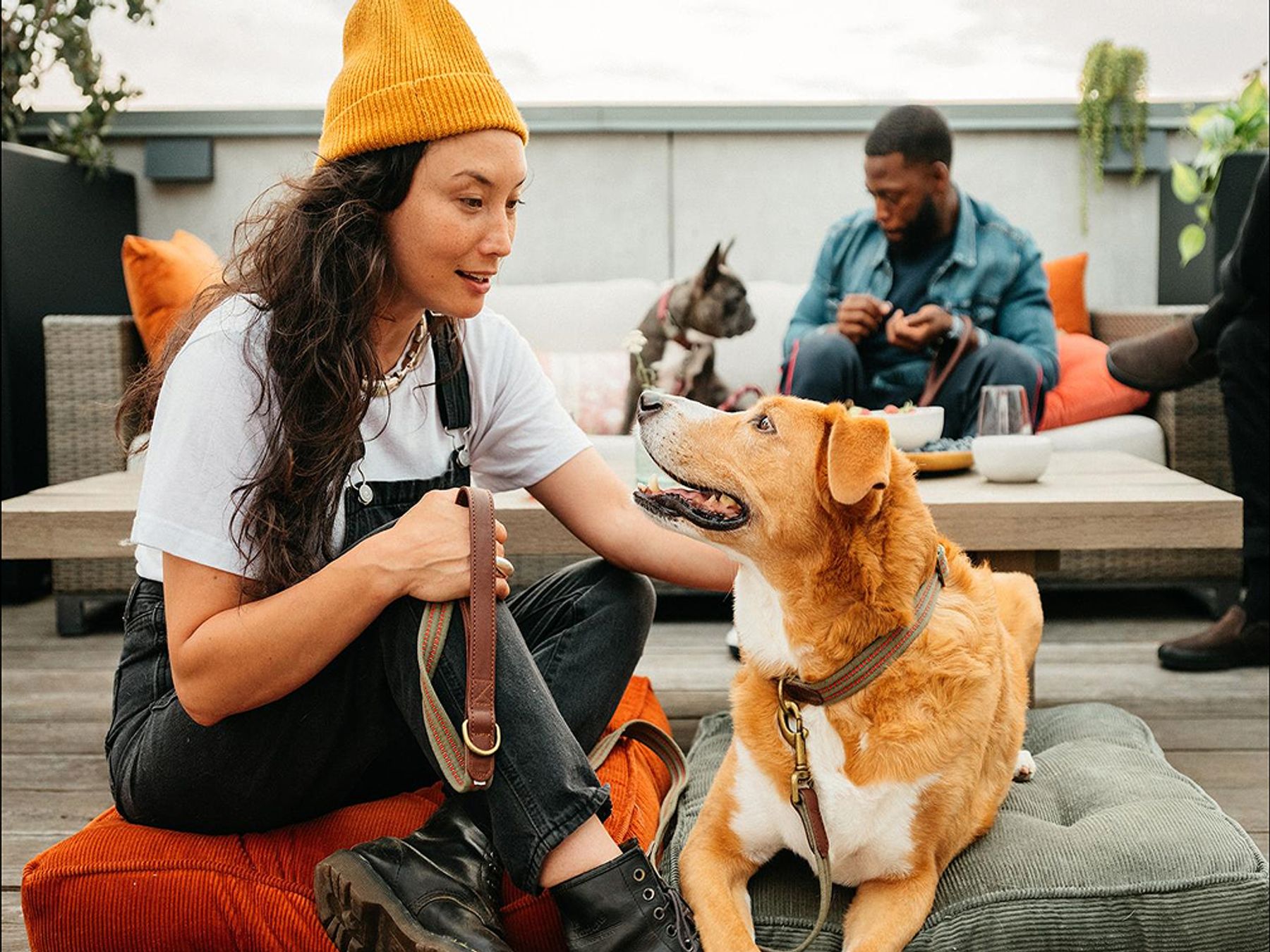 woman in hat with dog