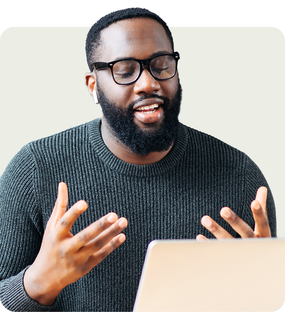man with glasses on call