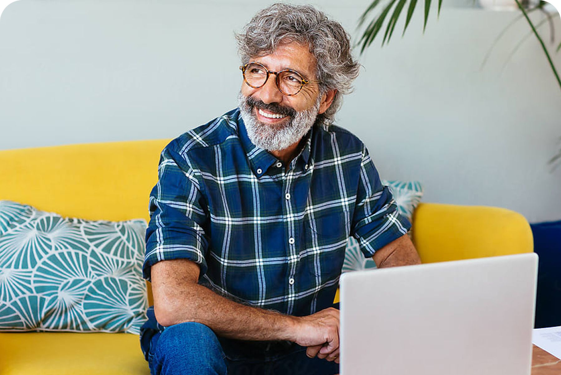Smiling man on laptop