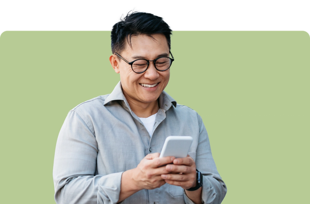 man looking at phone
