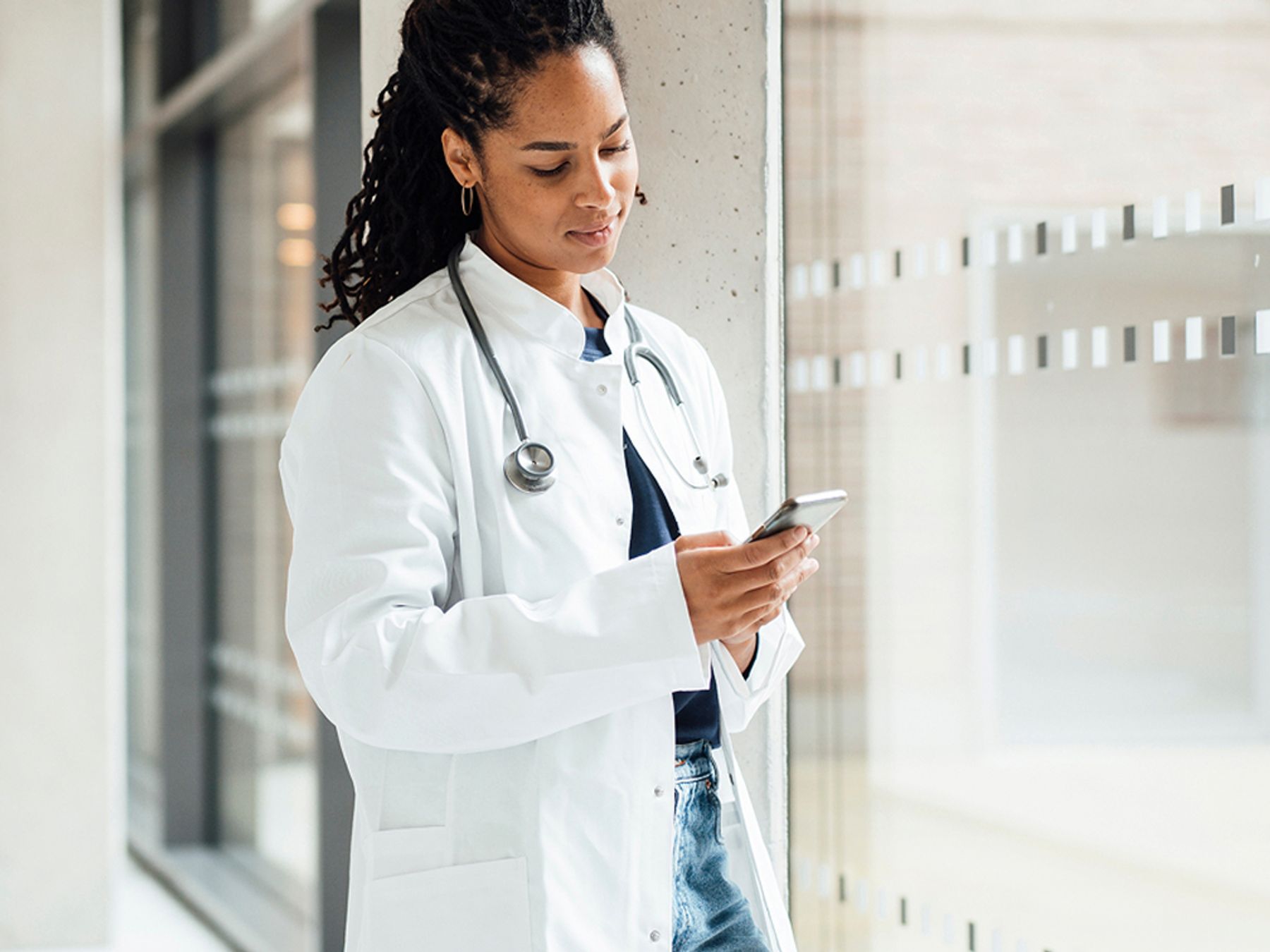 nurse looking at phone