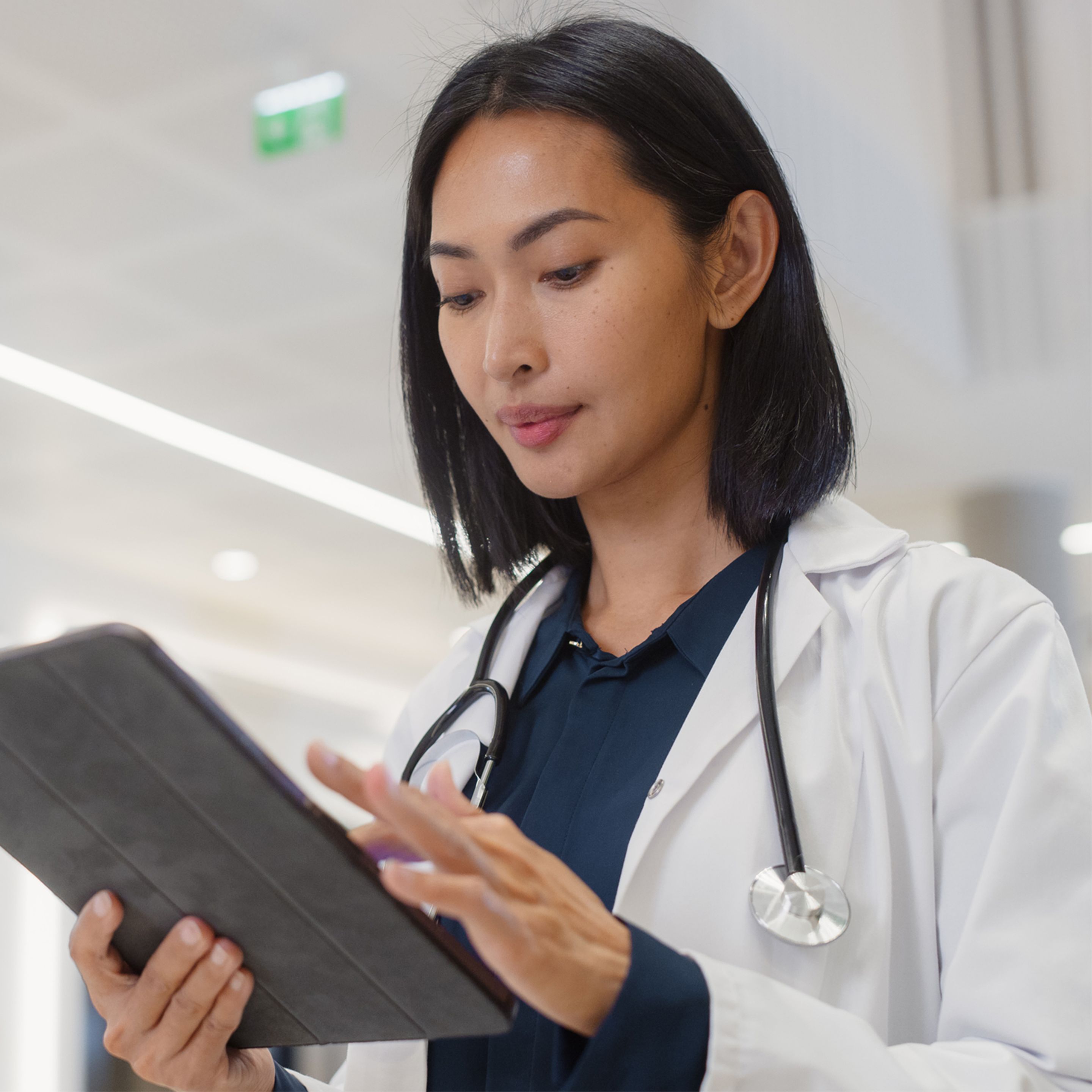 Medical professional looking at screen