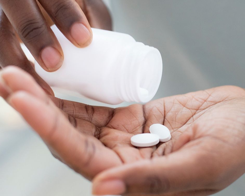 hand holding pills
