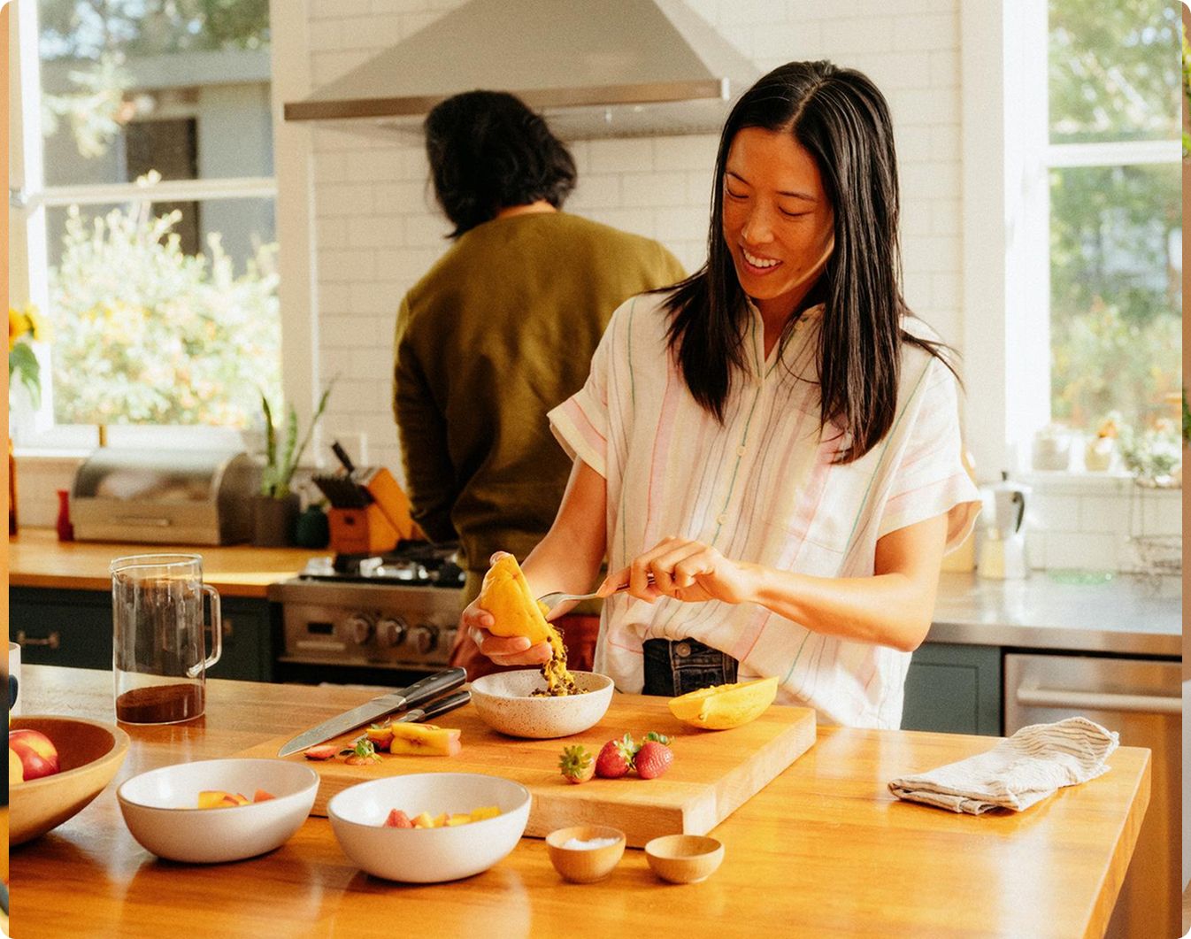 lady smiling in kitchen