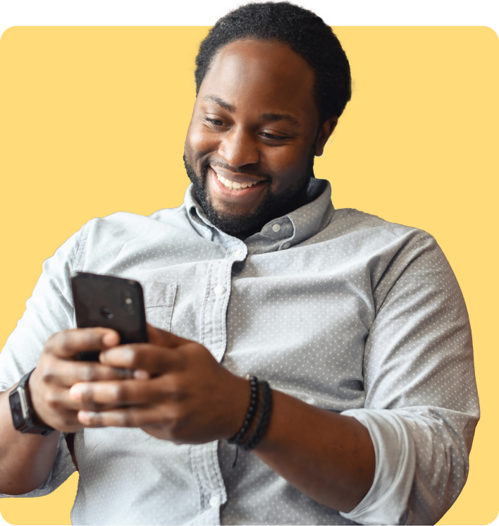 happy man watching his iPhone