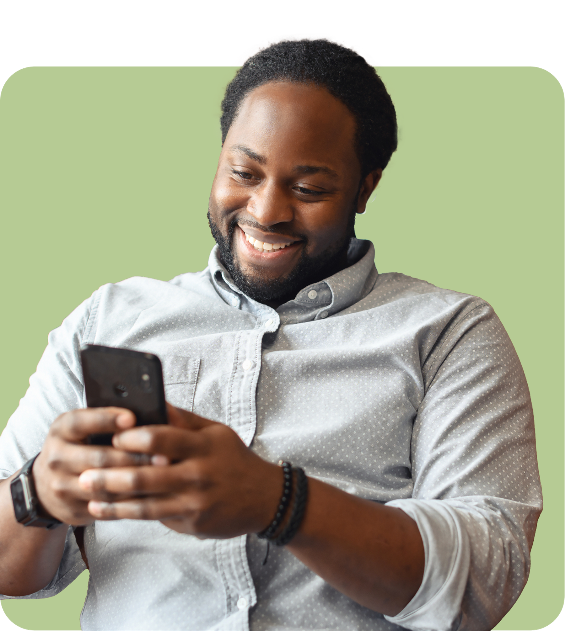 Member smiling while managing pharmacy benefits on his phone.