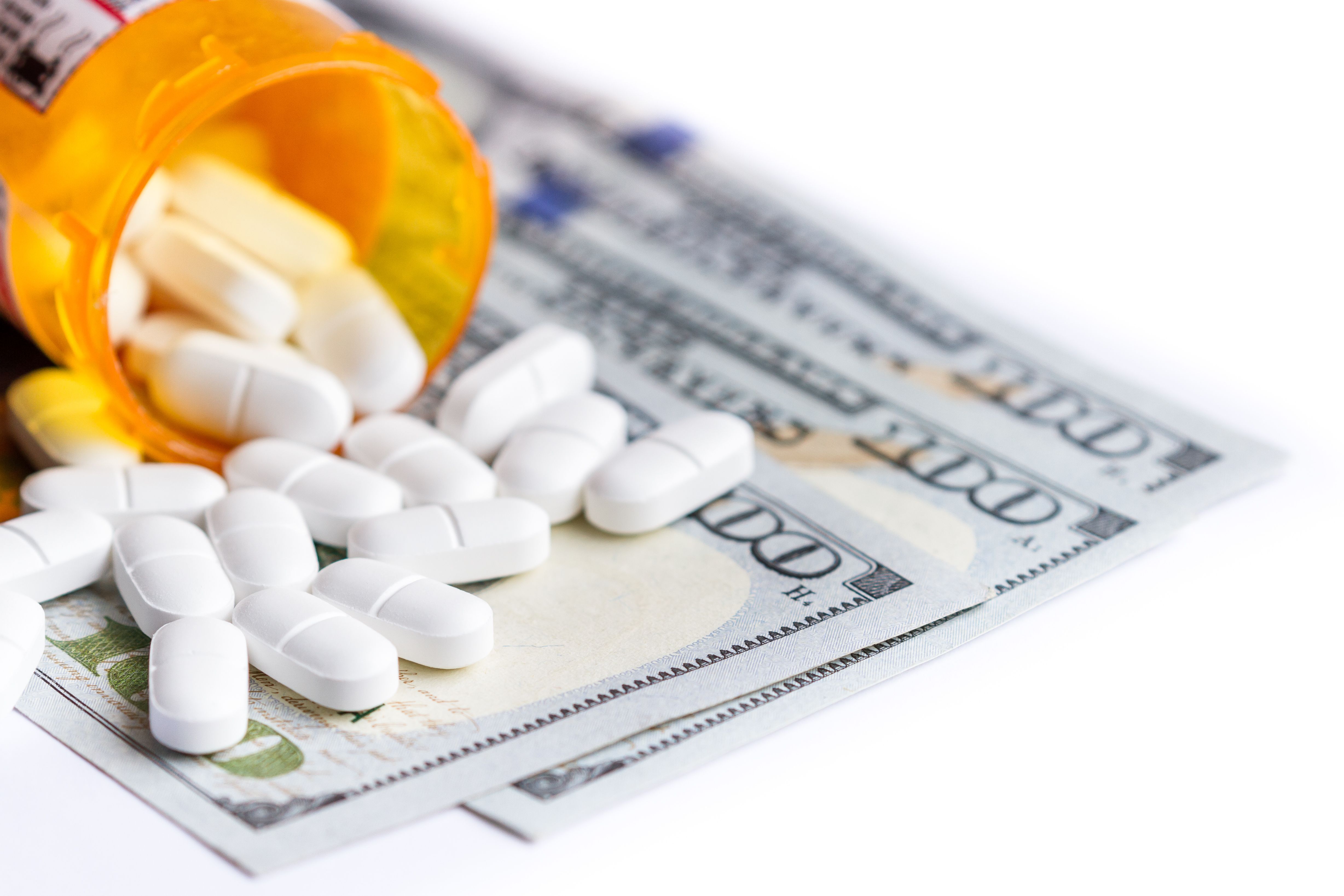 pills on top of money