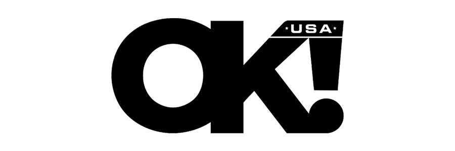 The black logo of OK! USA is on a white background. The ! is partially obscured by the K.